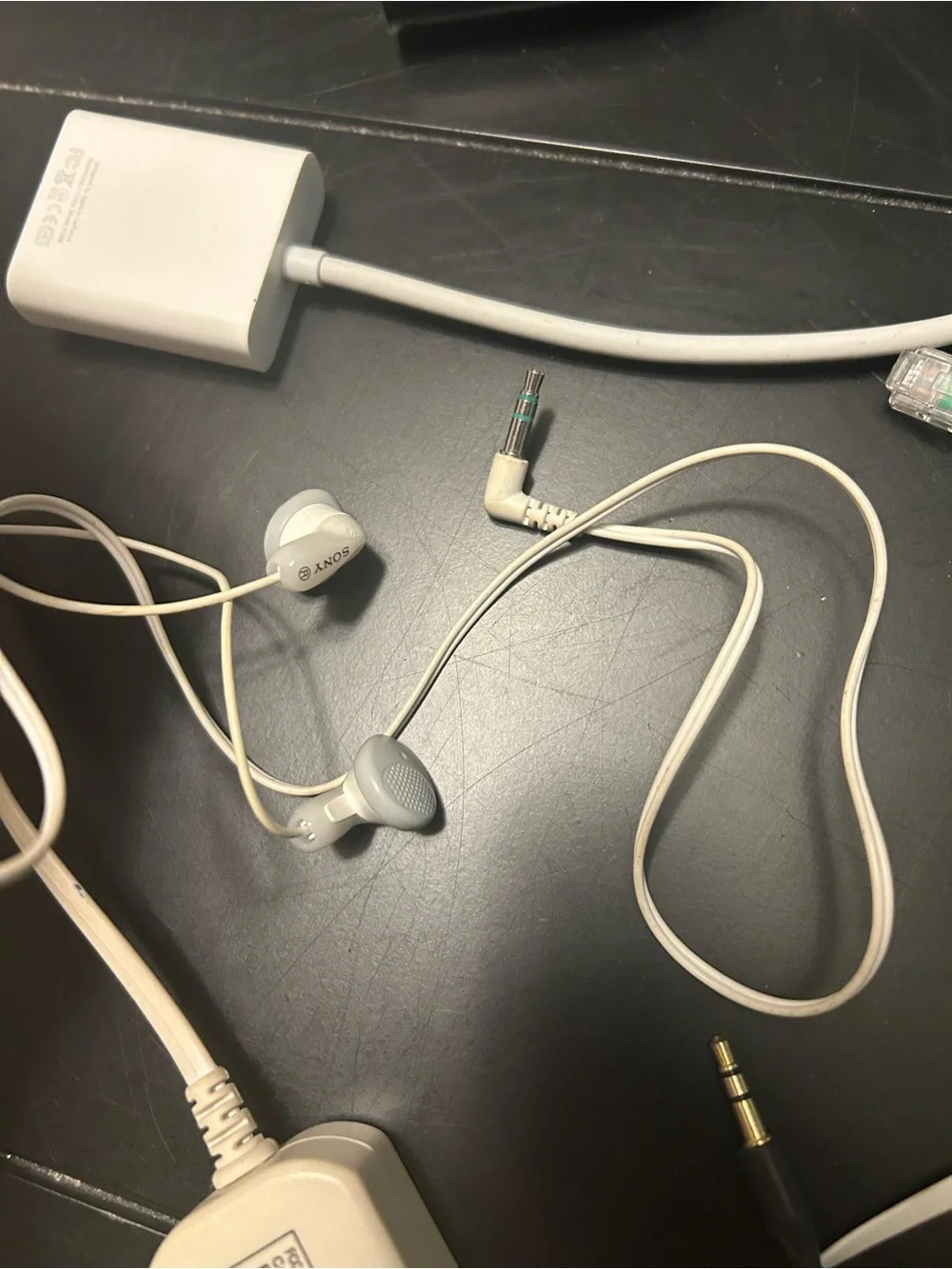 Assorted Green and White Cell Phone Accessory Cables and Adapters and more